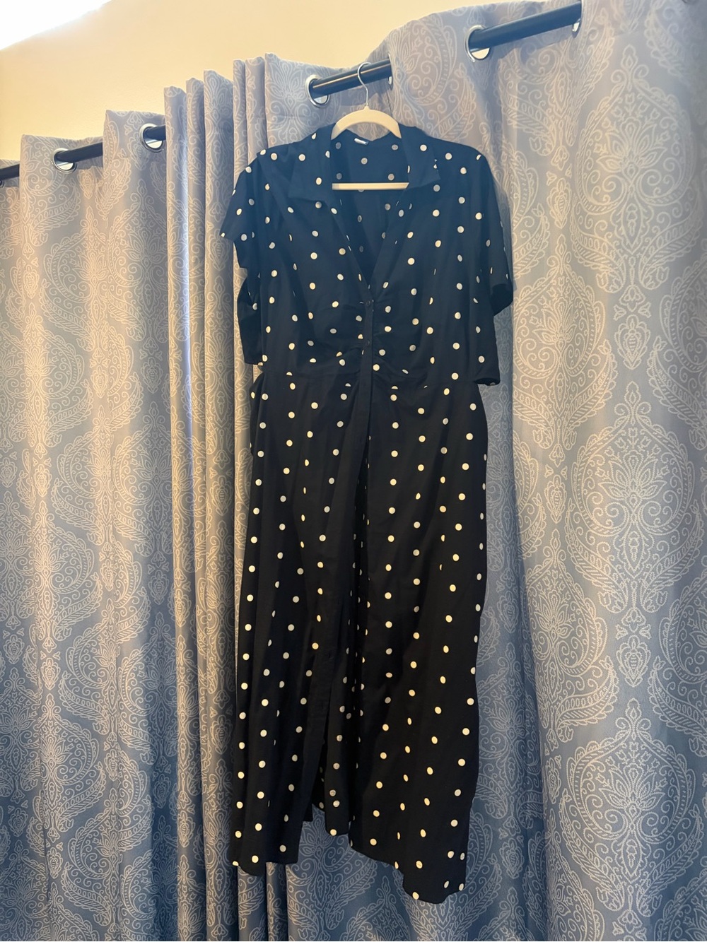 Old Navy Blue Polka Dot Midi Dress with side cutout and pockets.